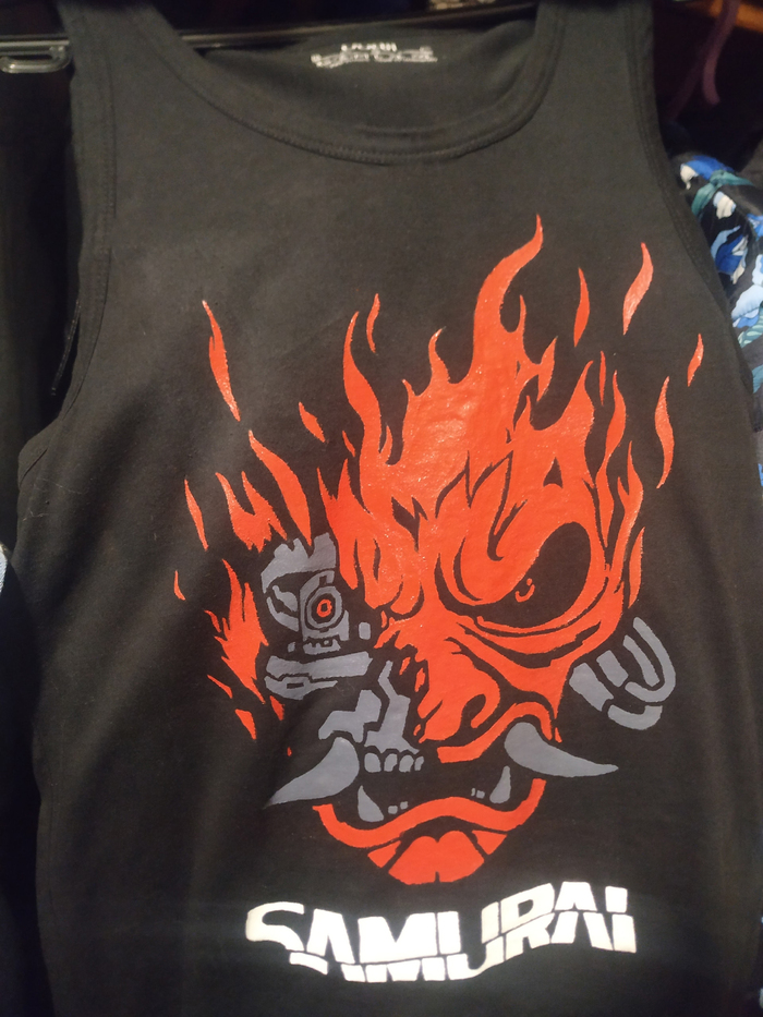 Кенту оч нравится игра "Киберпанк 2077", поэтому я решил ему подогнать майку Силверхенда на ДР. Разрисовал сам, первый опыт так сказать.