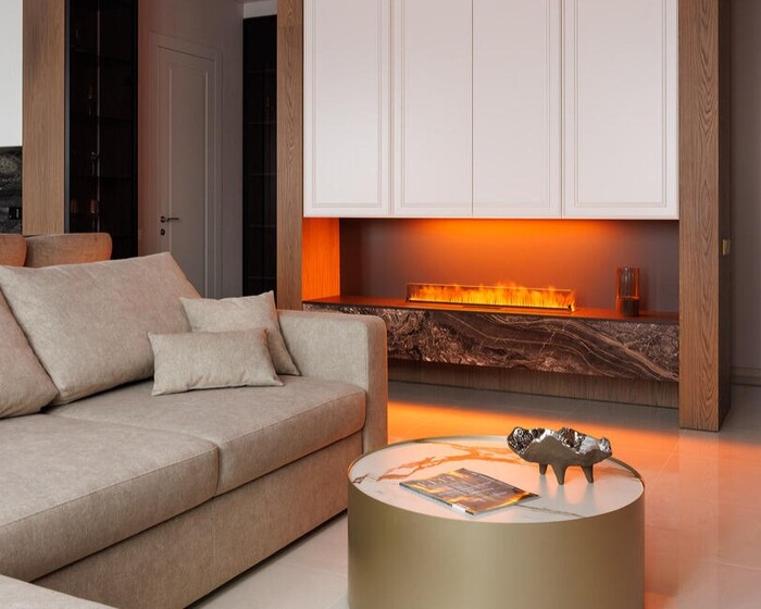 Дизайн интерьера квартиры в ЖК «Лосиноостровский парк», гостиная с элементами камня и дерева в отделке от студии Artum.