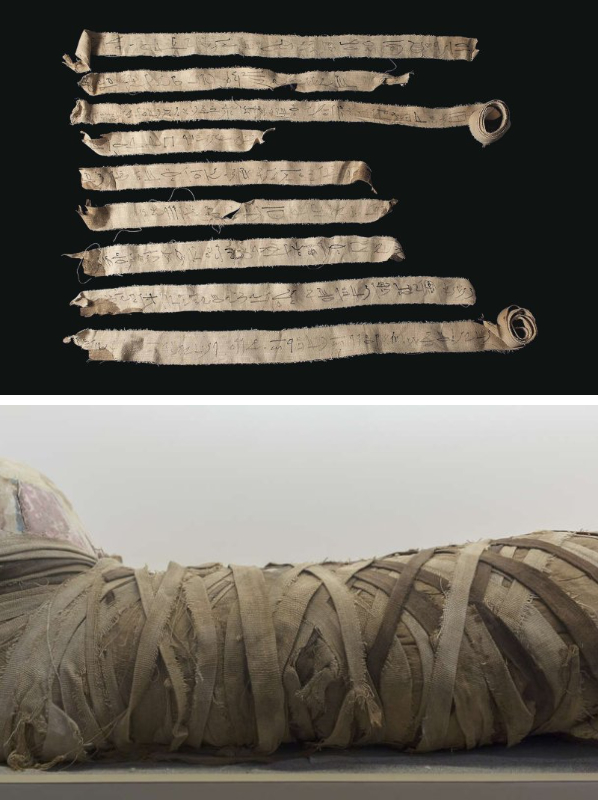 Бинты с письменами и мумия, завернутая в бинты